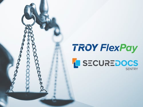 Image d'une balance légale avec les logos TROY FlexPay et SecureDocs Sentry au premier plan à droite.